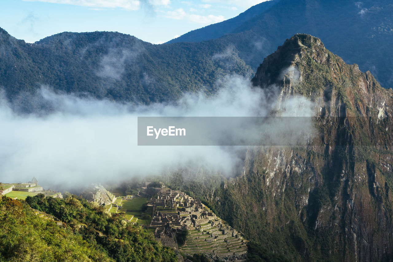 Machu picchu and huayna picchu in fog