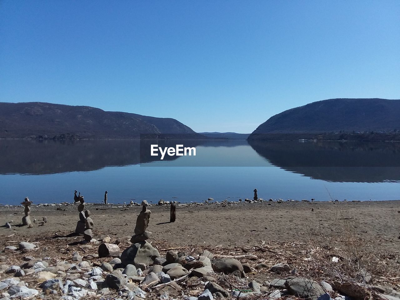 SCENIC VIEW OF BEACH AGAINST CLEAR SKY