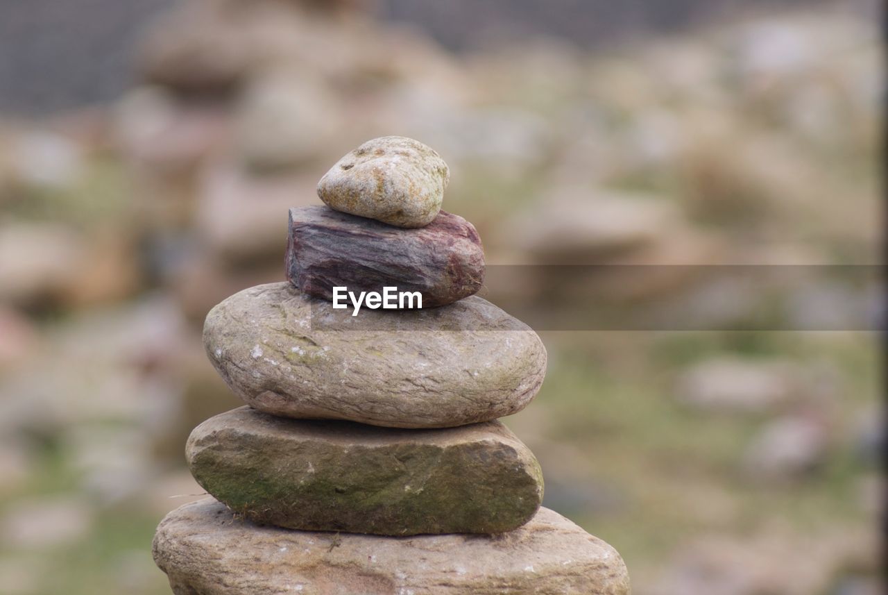 Close-up of stone stacked outdoors