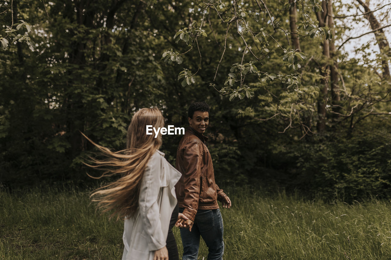 Smiling couple walking together