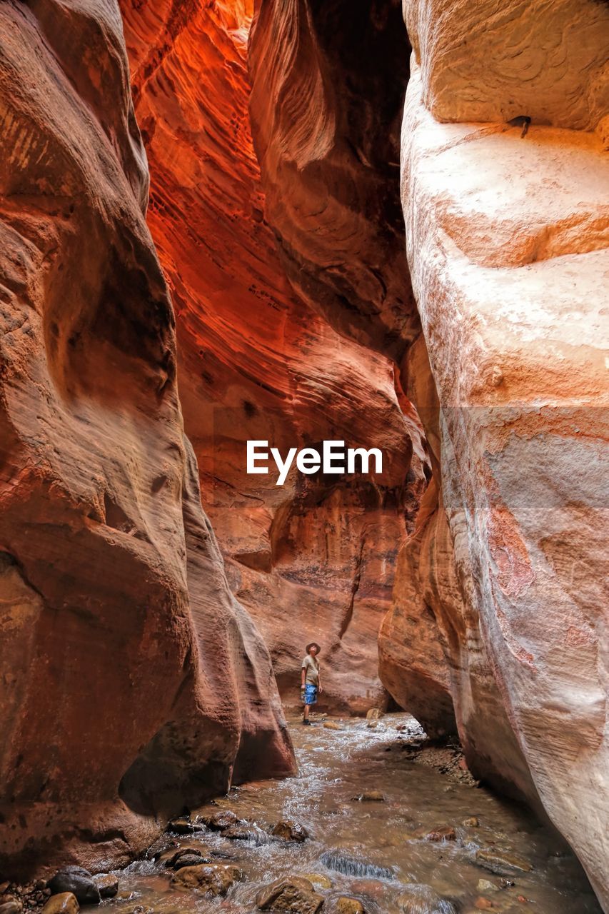 Full length of man standing amidst canyon