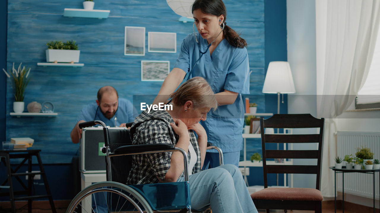 Doctor examining patient at hospital