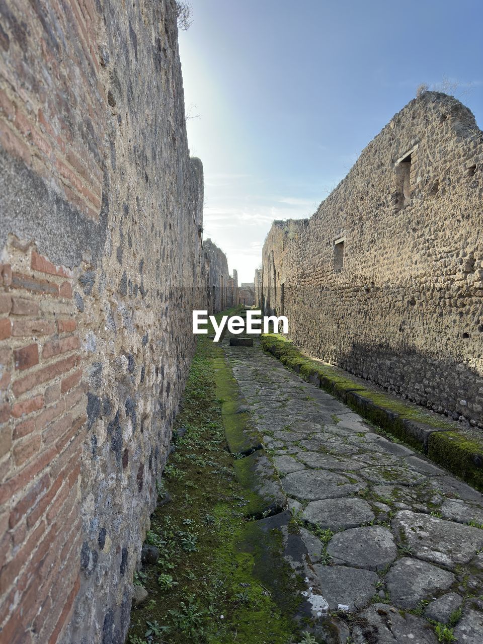 low angle view of old ruins against sky