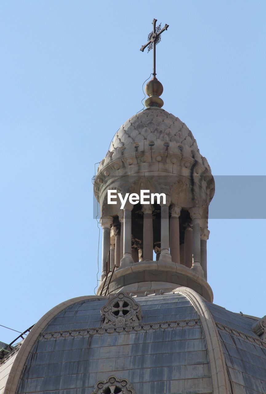 LOW ANGLE VIEW OF CHURCH AGAINST BLUE SKY