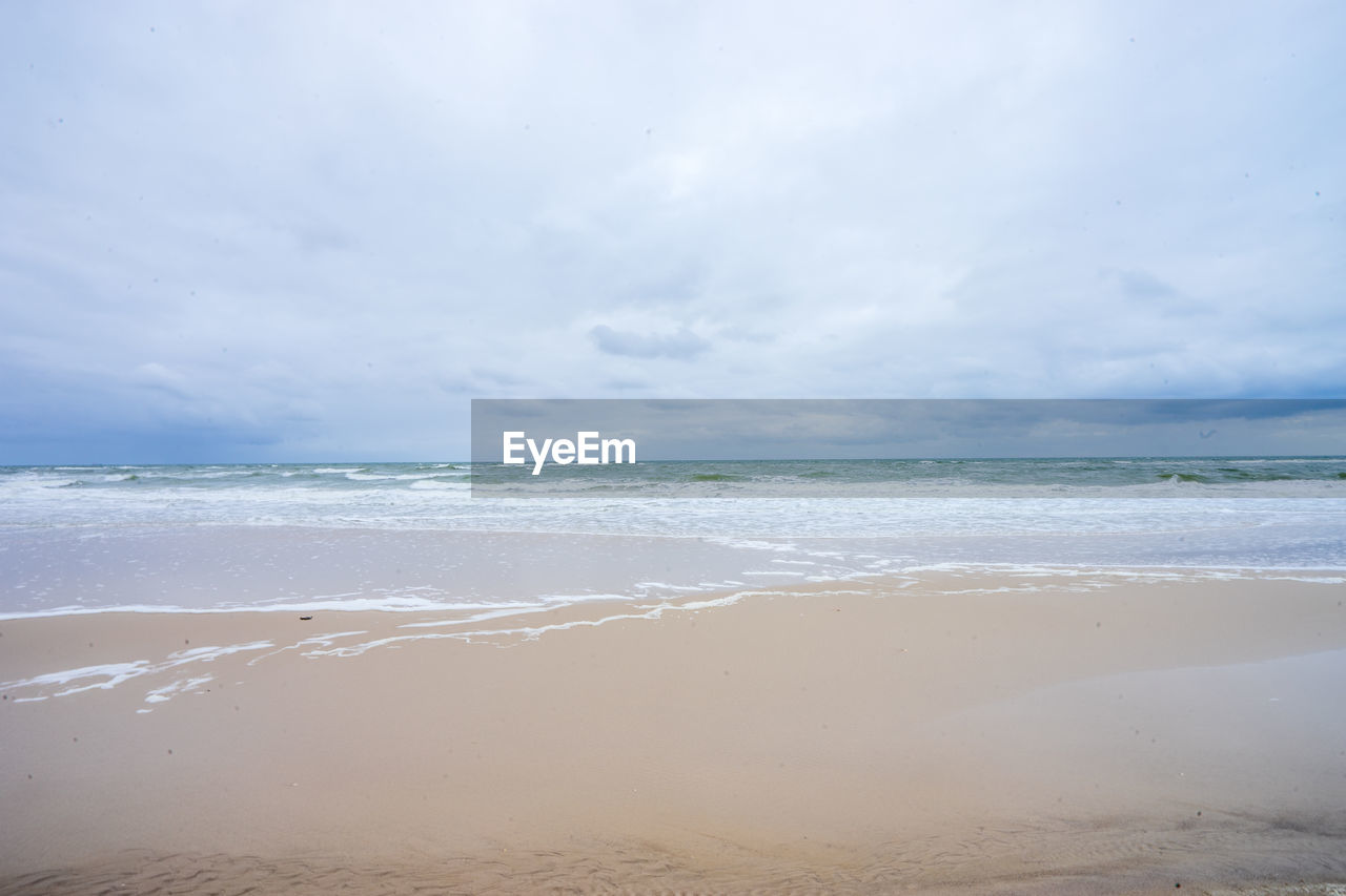 Scenic view of beach against sky