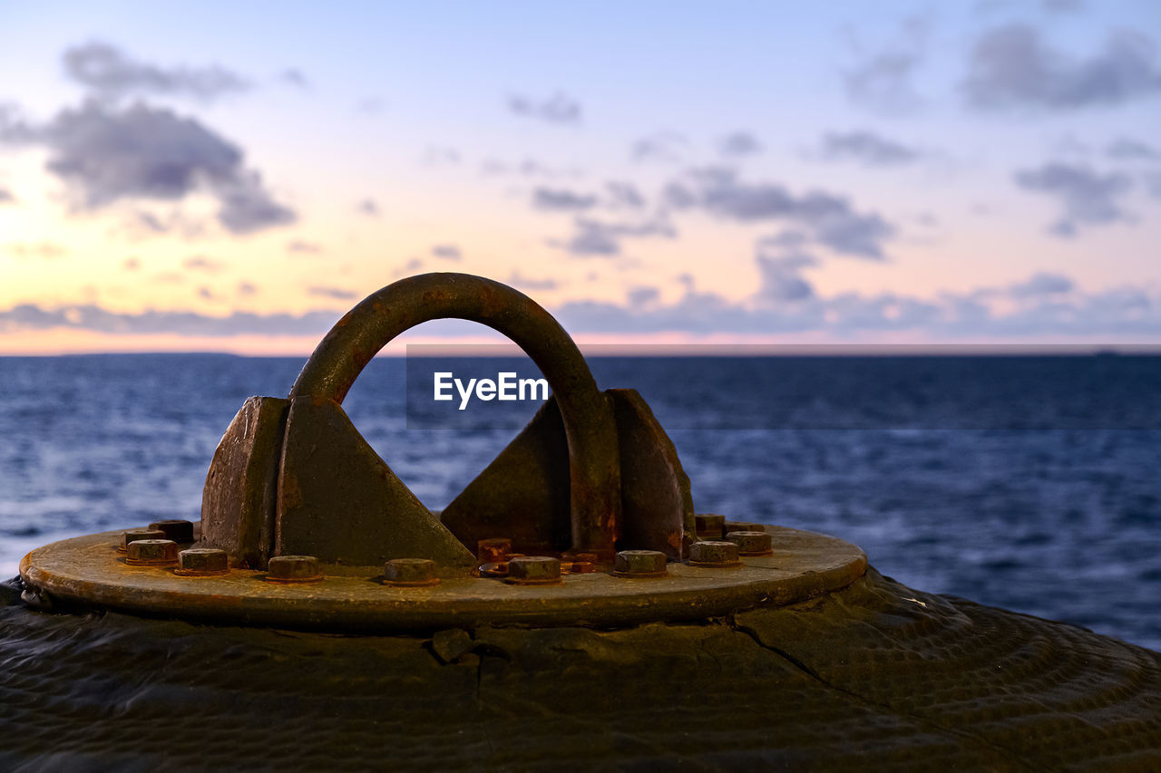 water, sea, sky, nature, sunset, ocean, cloud, beach, coast, land, no people, horizon, scenics - nature, horizon over water, beauty in nature, shore, reflection, sand, tranquility, nautical vessel, outdoors, evening, travel destinations, wave, rock, tranquil scene, focus on foreground, dusk