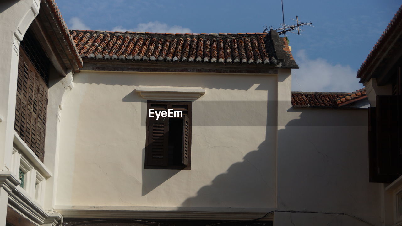 Low angle view of building against sky