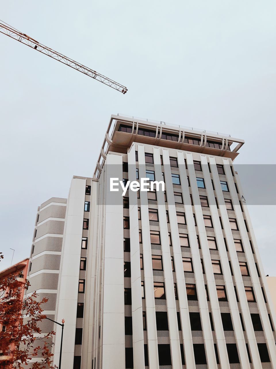 LOW ANGLE VIEW OF TRADITIONAL BUILDING AGAINST SKY