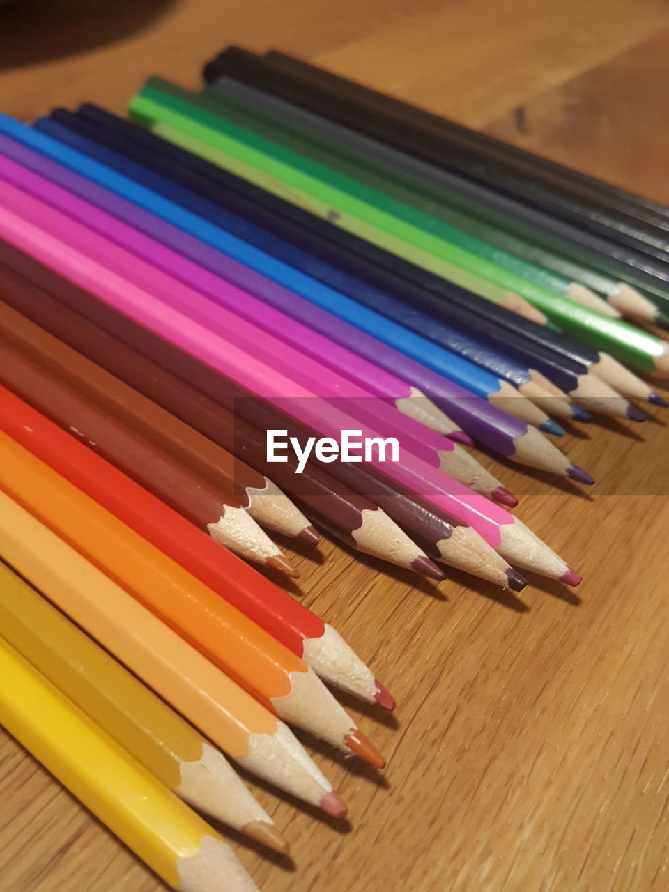 High angle view of colored pencils on table