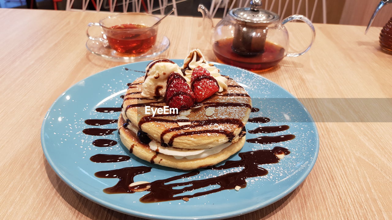 High angle view of pancakes served on table