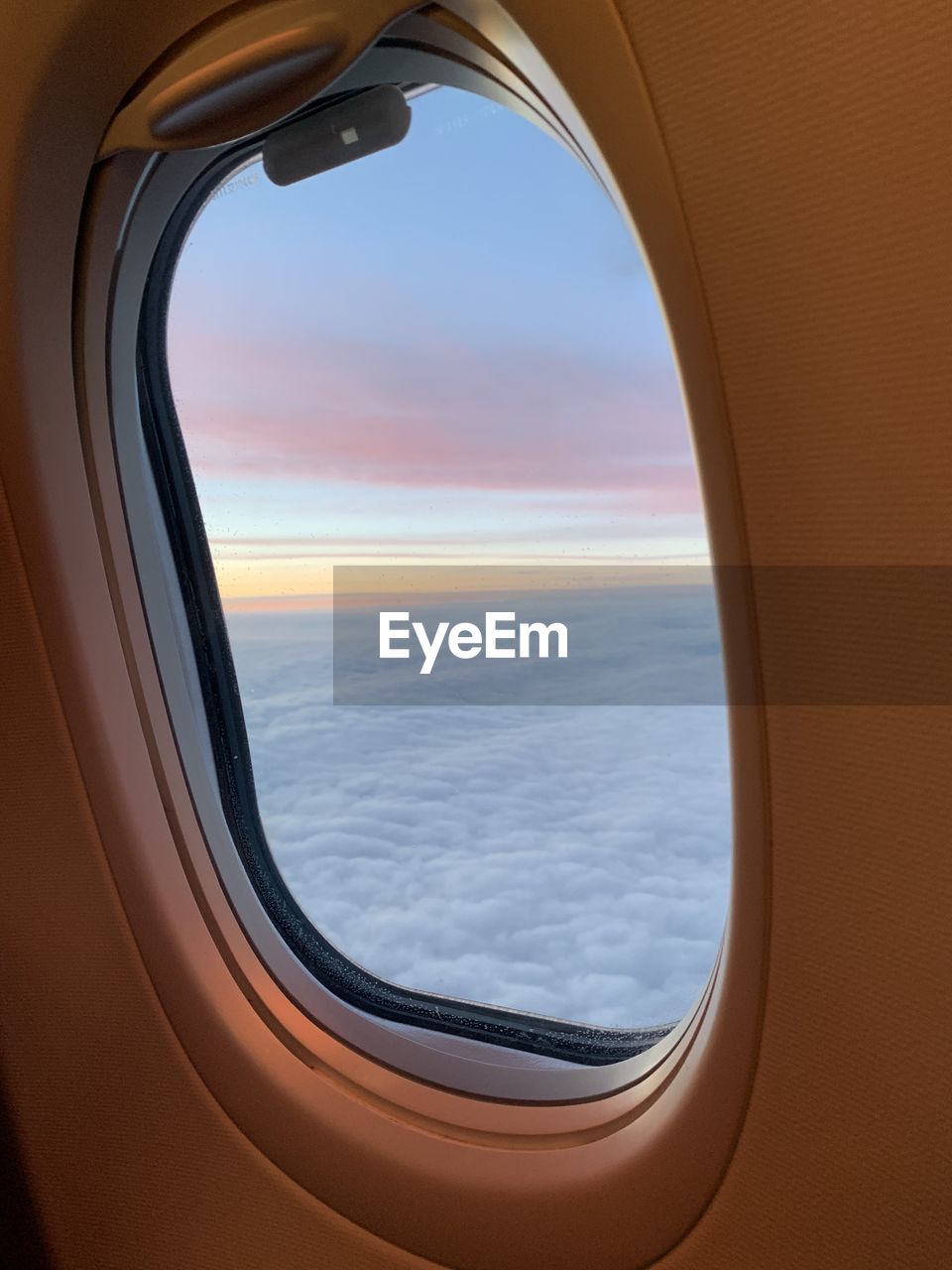 Scenic view of sky seen through airplane window