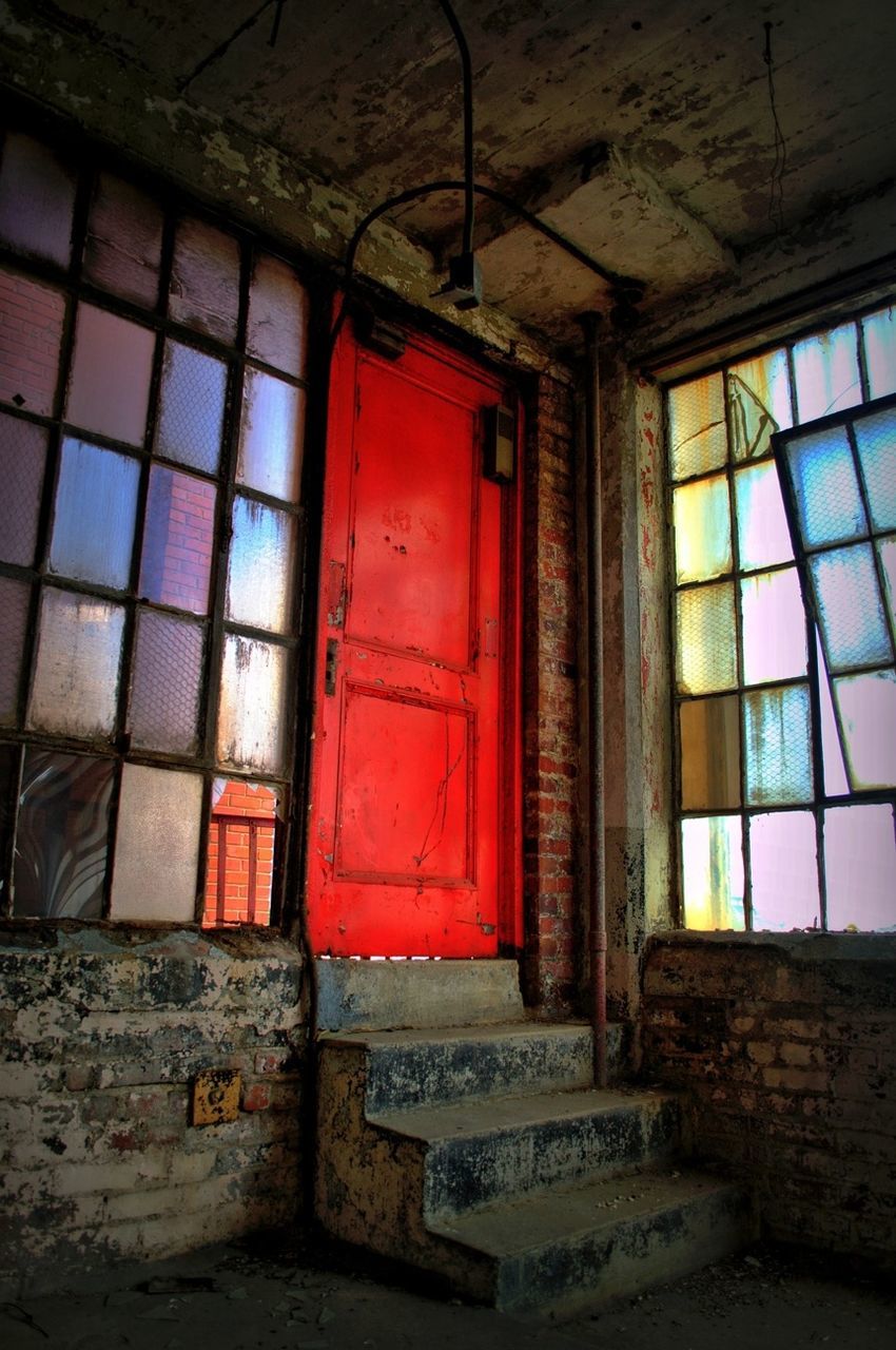 Old red door in building