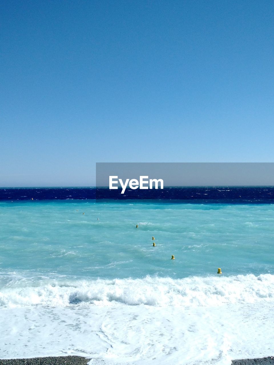 SCENIC VIEW OF BLUE SEA AGAINST CLEAR SKY