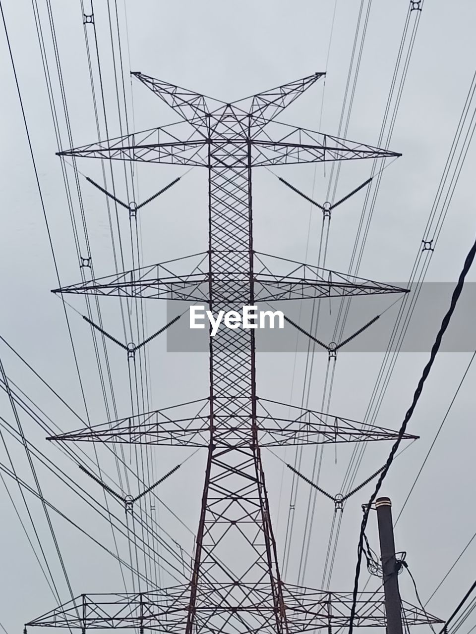low angle view of electricity pylon