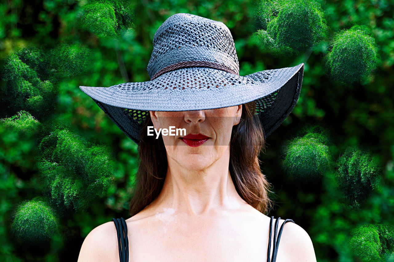 PORTRAIT OF WOMAN IN HAT