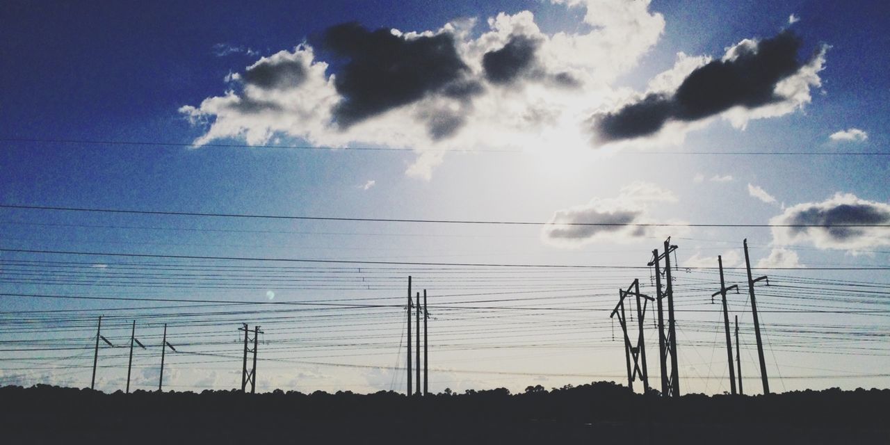 LOW ANGLE VIEW OF ELECTRICITY PYLON AGAINST SKY