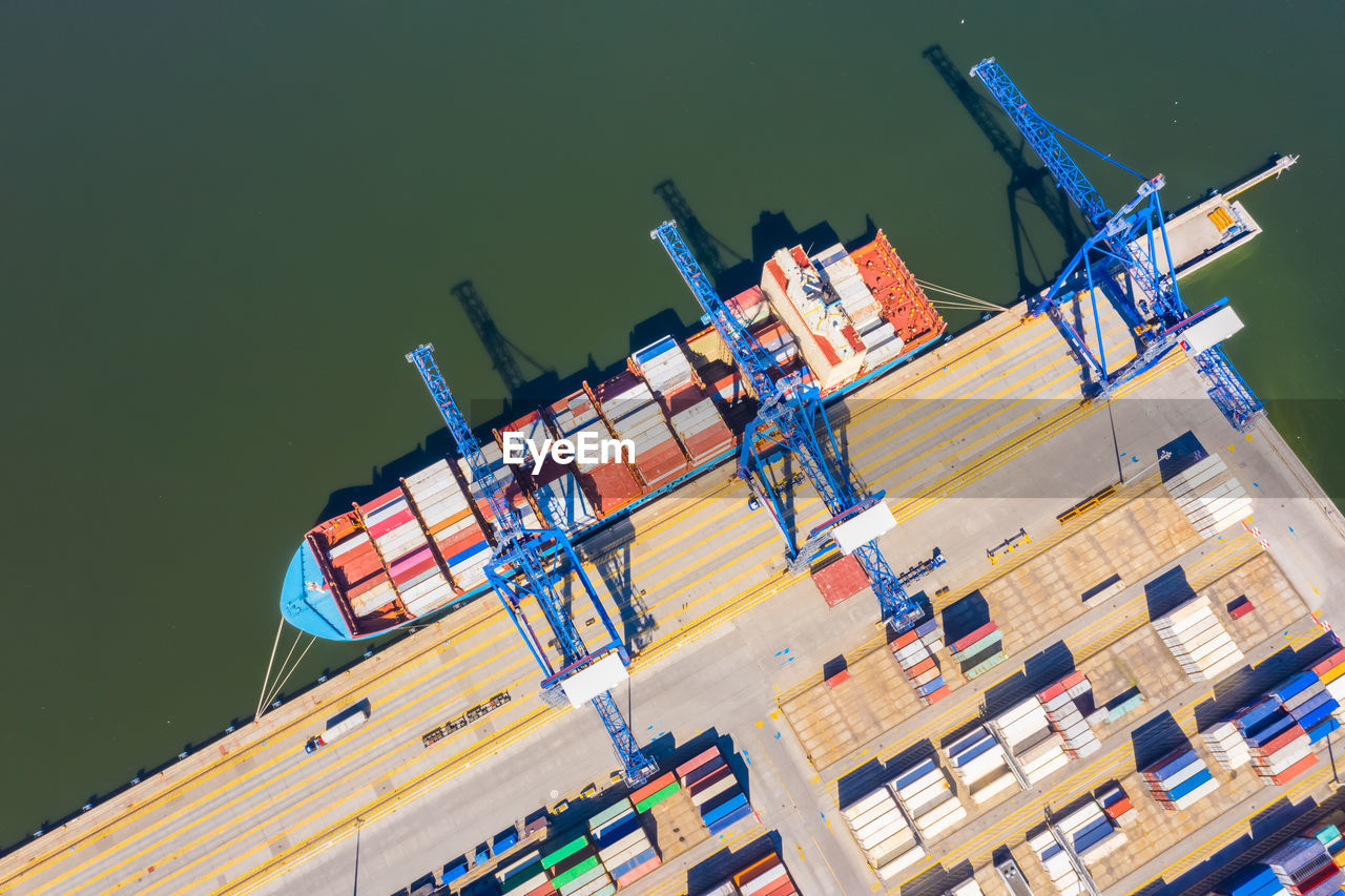 Aerial top view container cargo ship, in import export business logistic and transportation 
