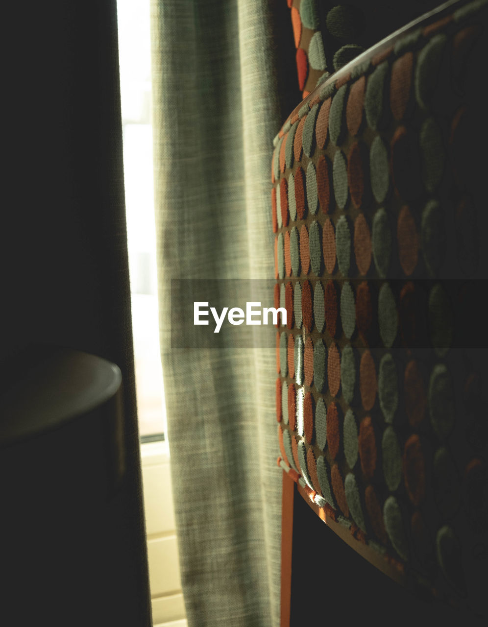 CLOSE-UP OF CURTAIN ON WINDOW