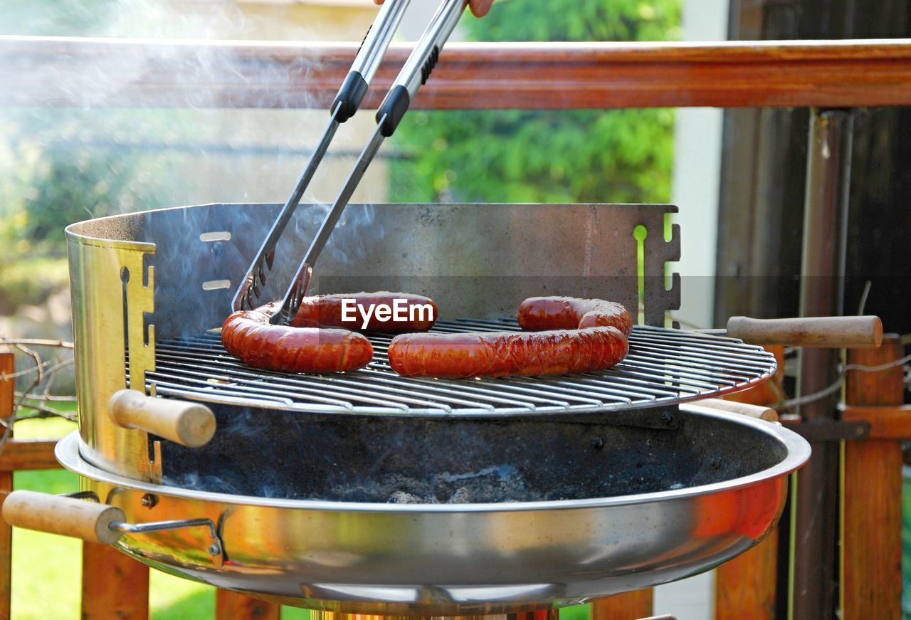 CLOSE-UP OF MEAT IN BARBECUE GRILL