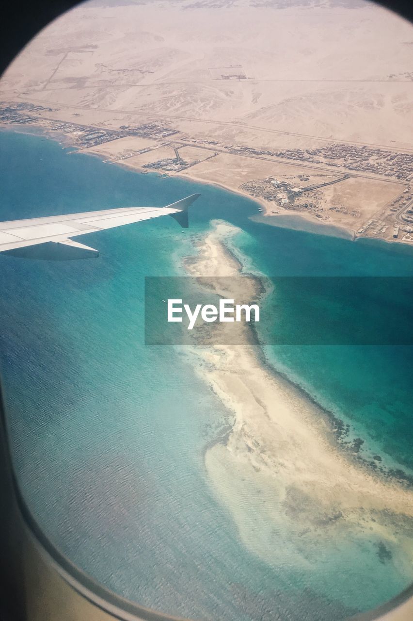 AERIAL VIEW OF SEA FROM AIRPLANE