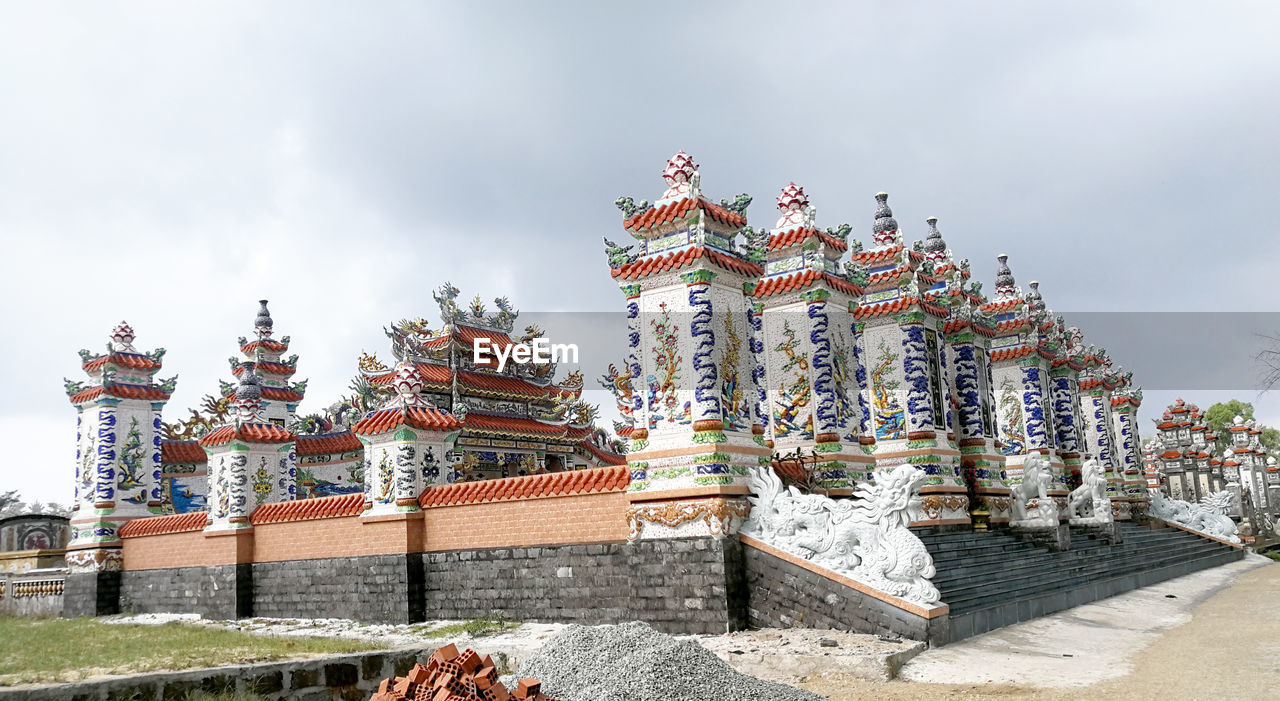 VIEW OF TEMPLE AGAINST BUILDING