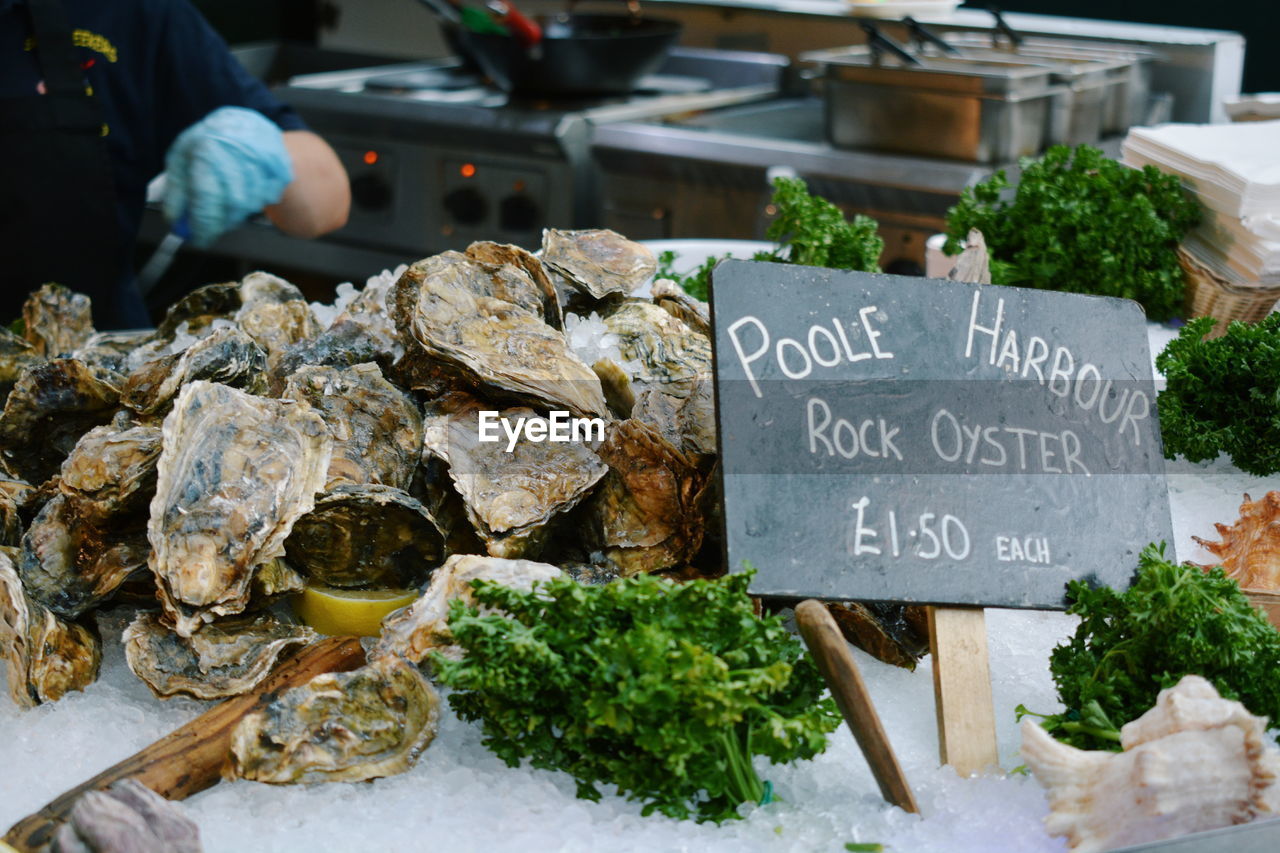 Close-up of oysters for sale at food store