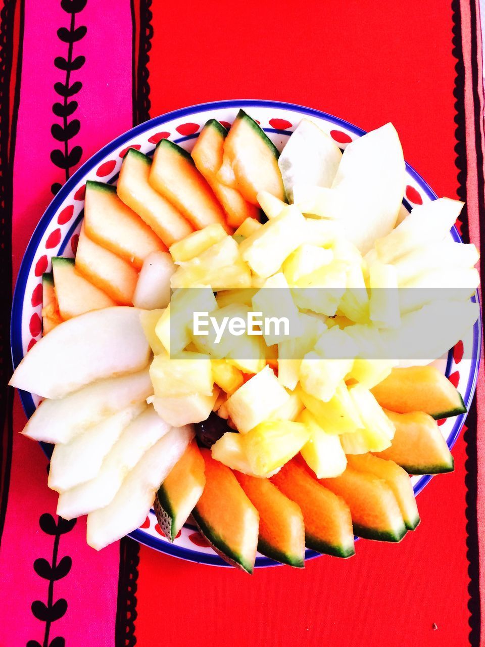 Sliced fruit on plate