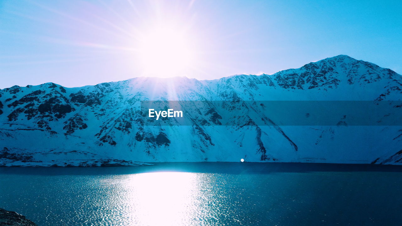 Scenic view of frozen lake against sky