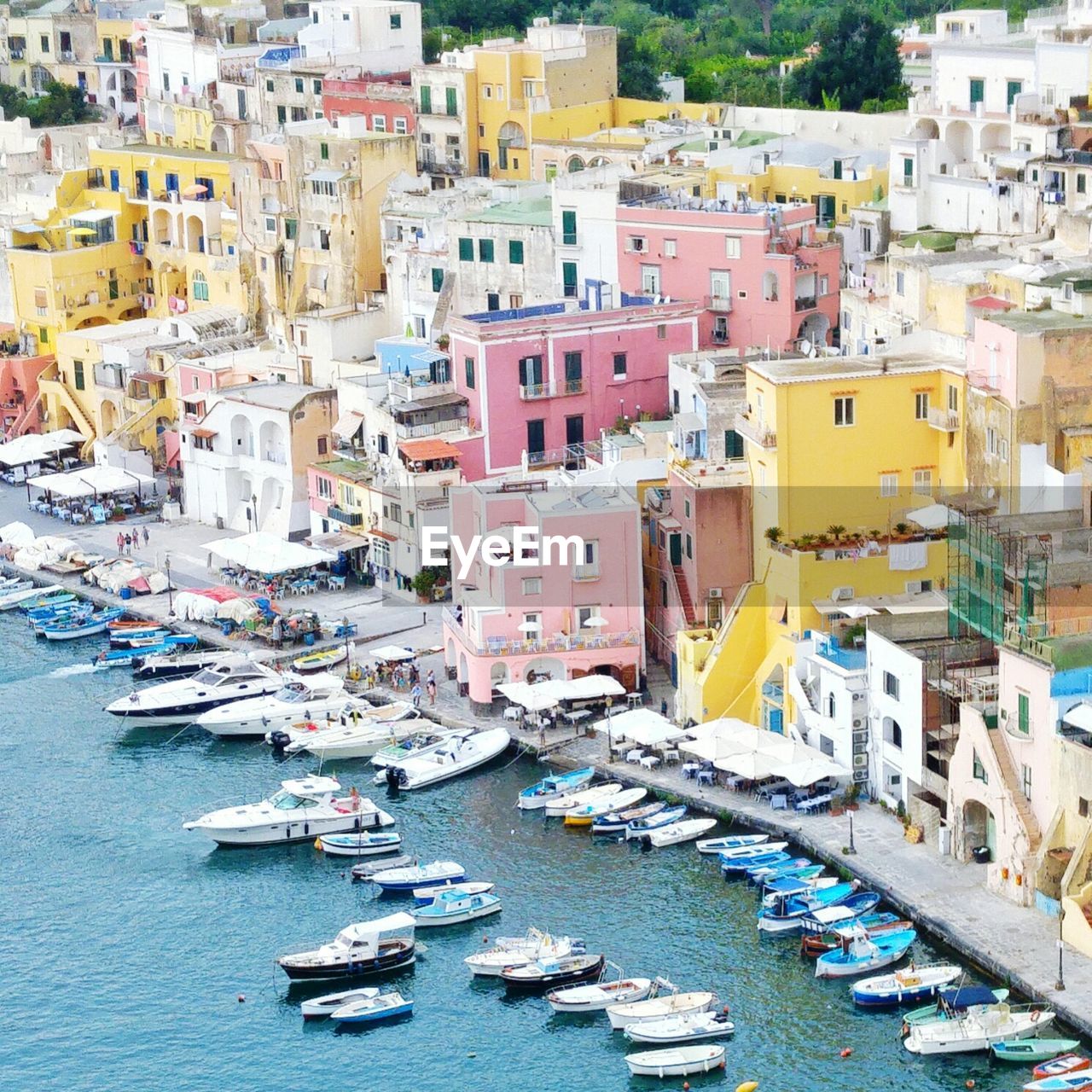 BOATS MOORED IN SEA