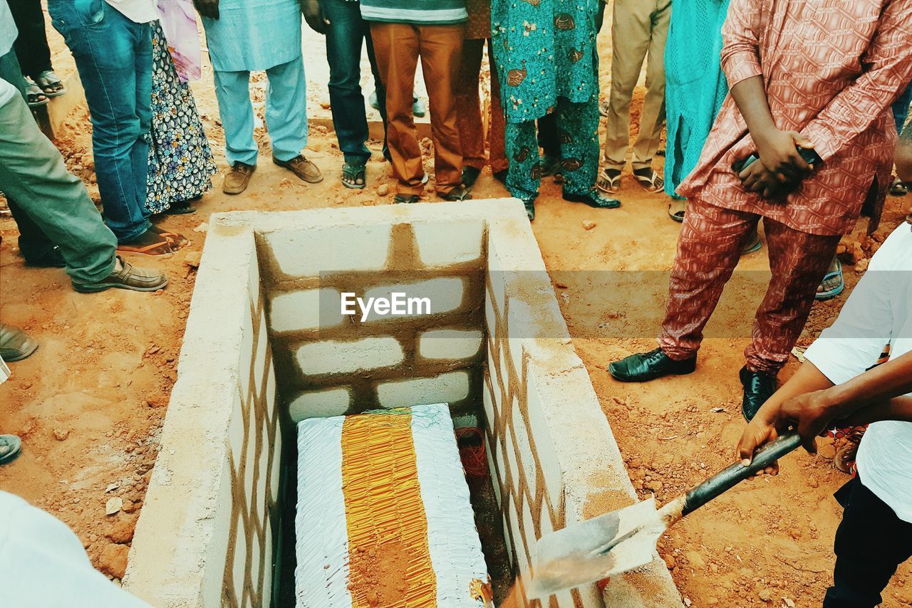 Low section of people at the burial ground