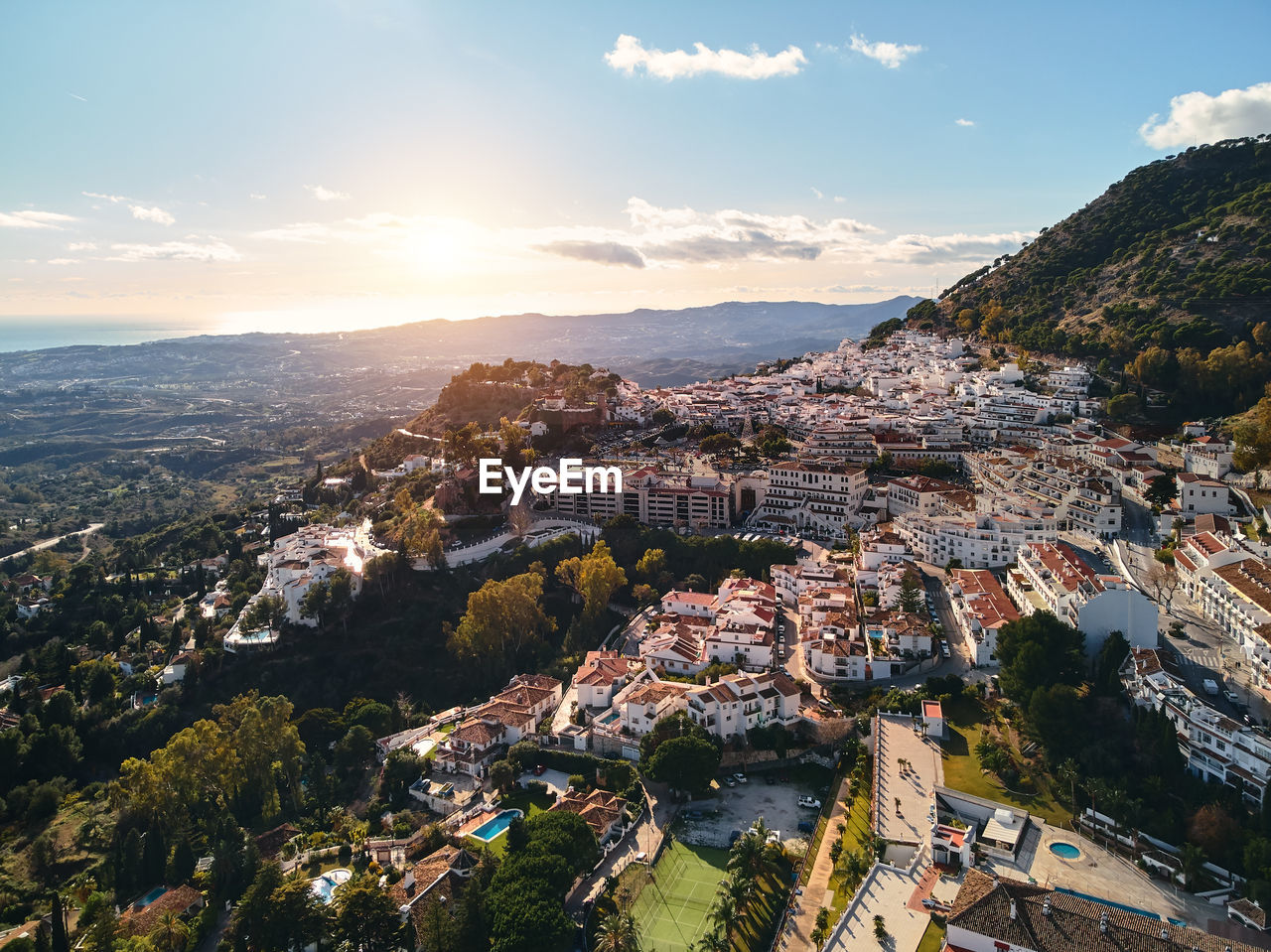 Aerial view of townscape against sky