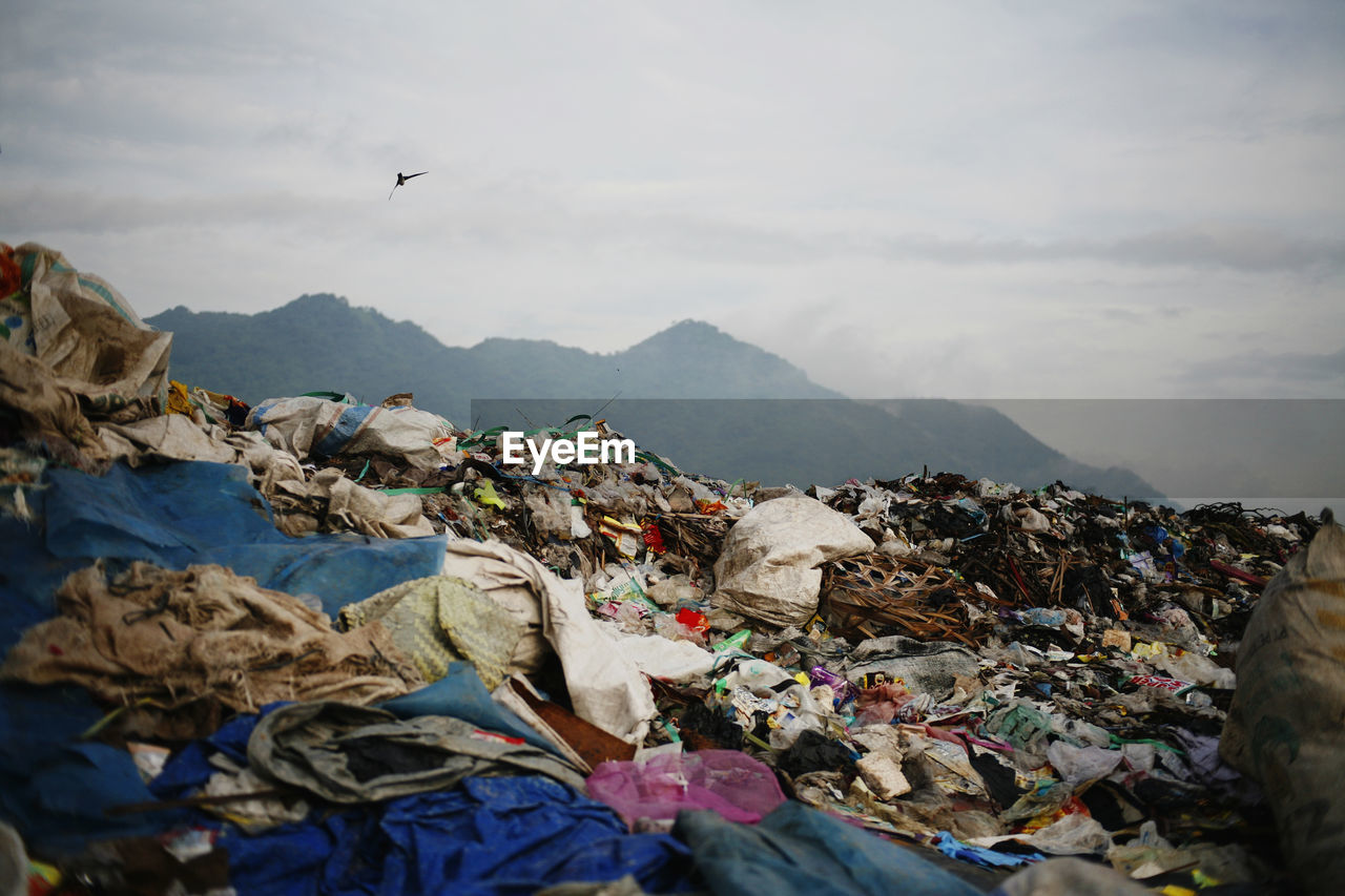 Garbage in mountains against sky