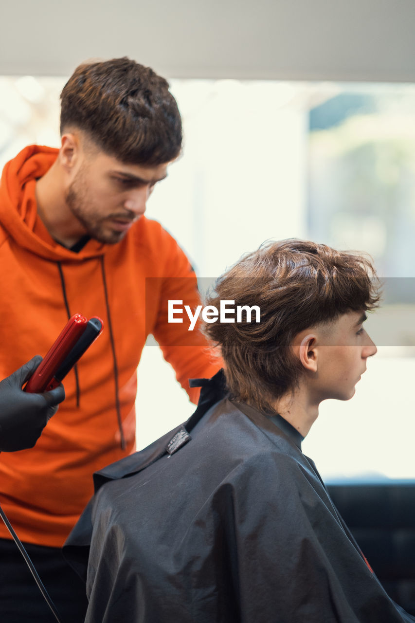 Barber haircut in a barbershop