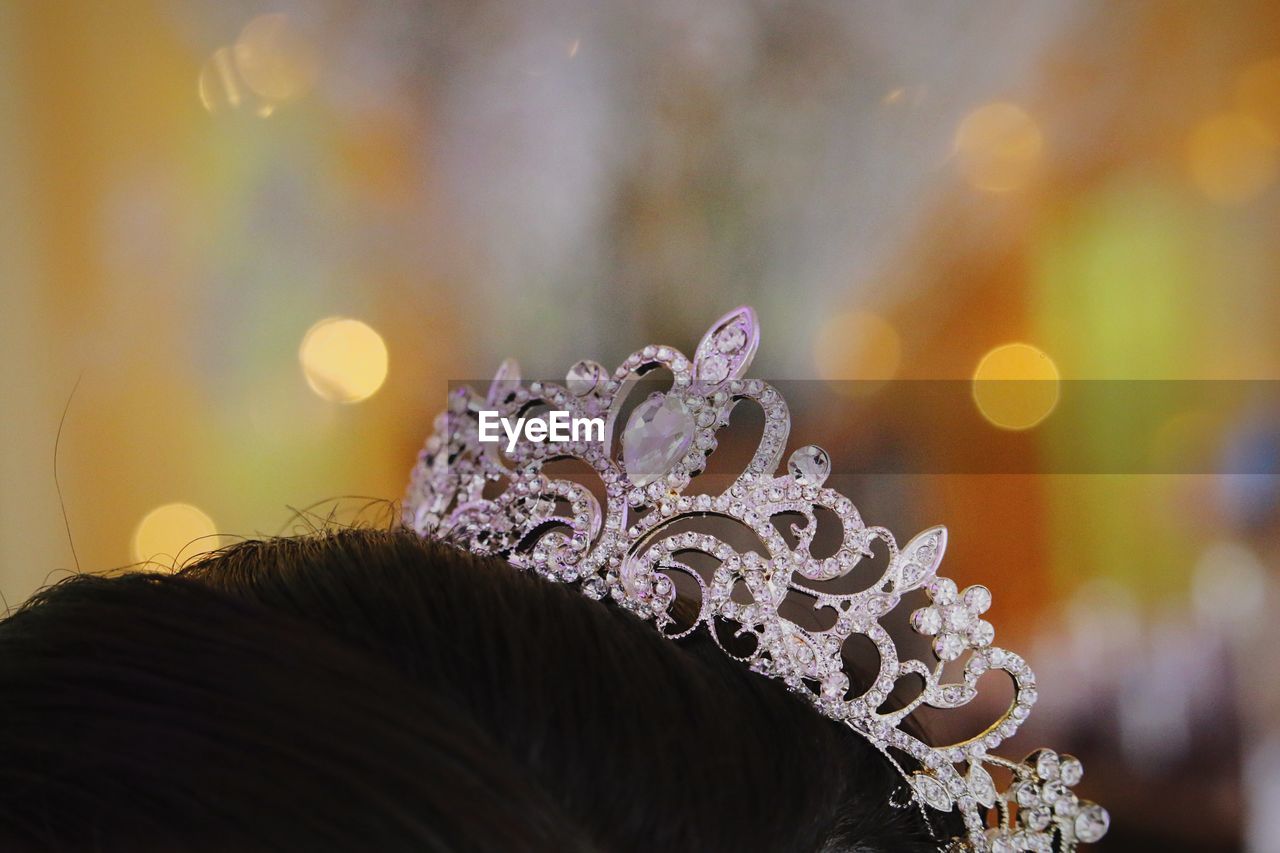 Close-up of woman wearing tiara on head