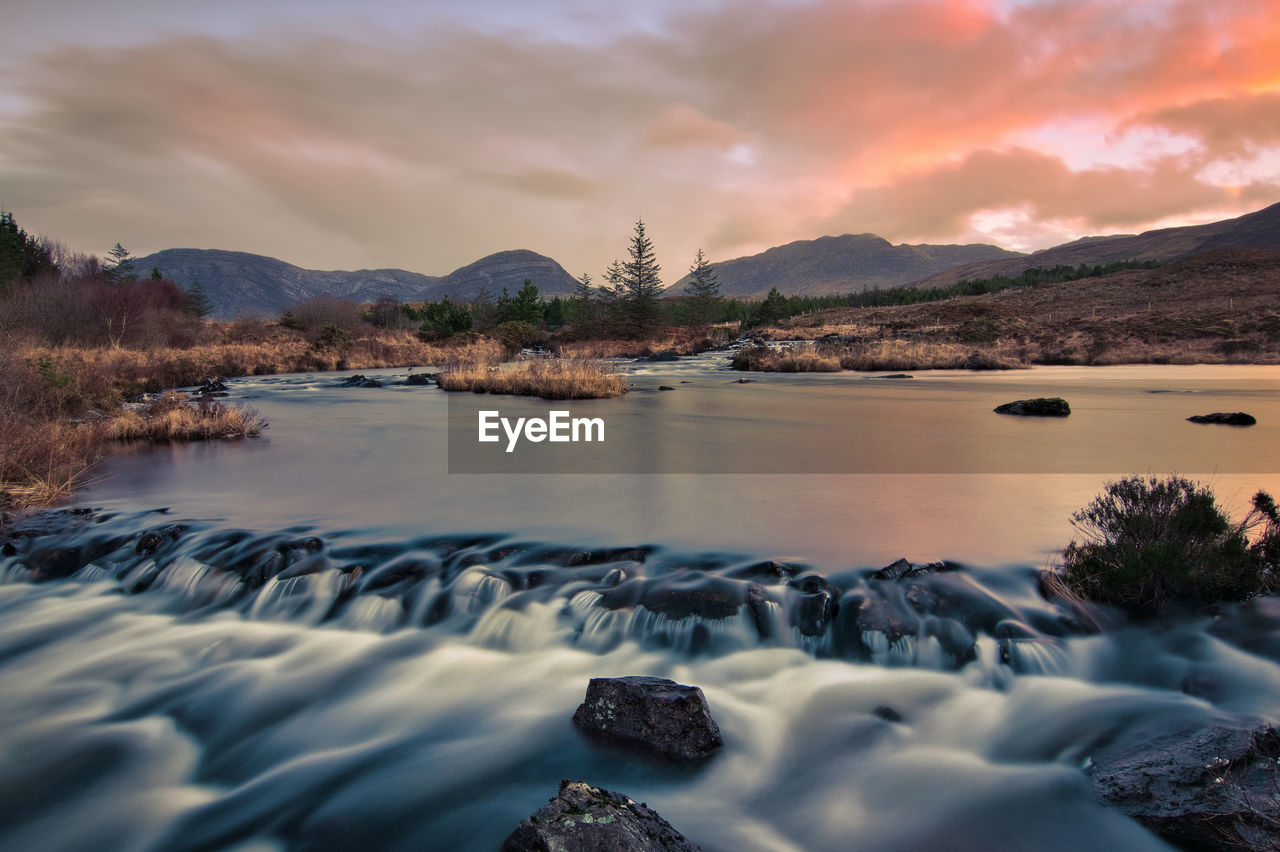 Sunrise scenery, river and mountains, derryclare reserve, connemara, galway, ireland 