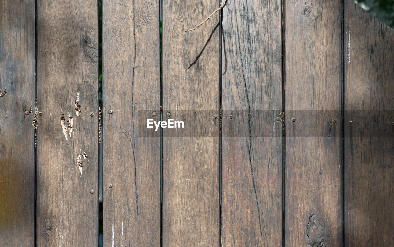 wood, backgrounds, textured, pattern, full frame, plank, no people, wood grain, close-up, fence, old, brown, floor, flooring, weathered, hardwood, wall - building feature, wall, rough, day, outdoors, in a row, wood paneling, timber, architecture, built structure, wood flooring, nature, striped, tree, abstract, security, material
