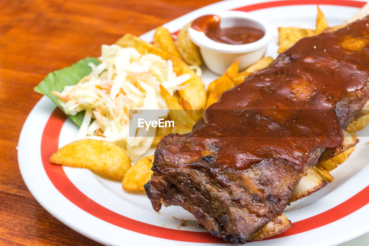 Close-up of barbecue rib in plate