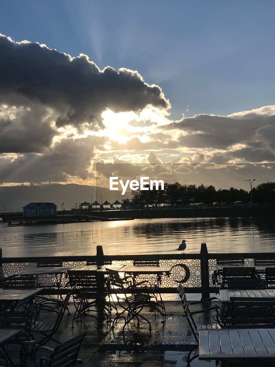 Scenic view of lake against sky during sunset