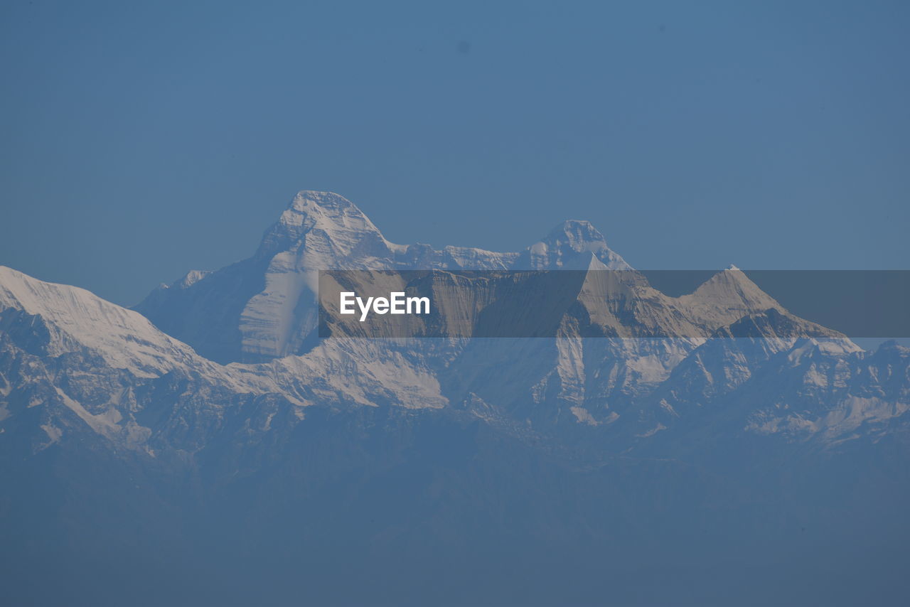 SCENIC VIEW OF SNOWCAPPED MOUNTAIN AGAINST SKY