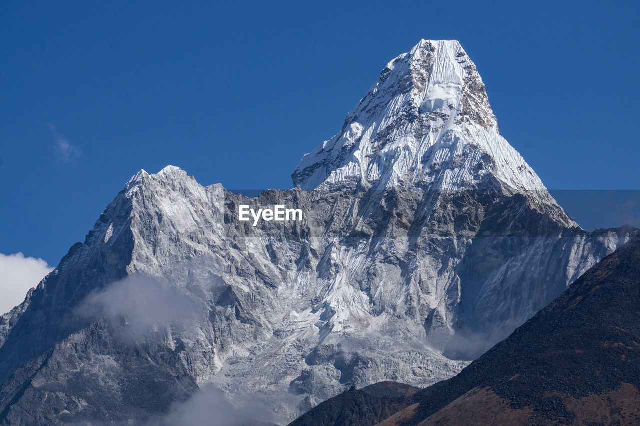 Scenic view of snowcapped mountains against sky, ama dablam