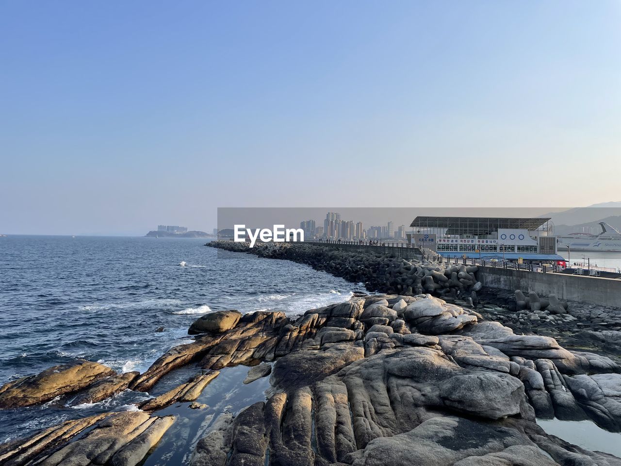 scenic view of sea against sky at sunset