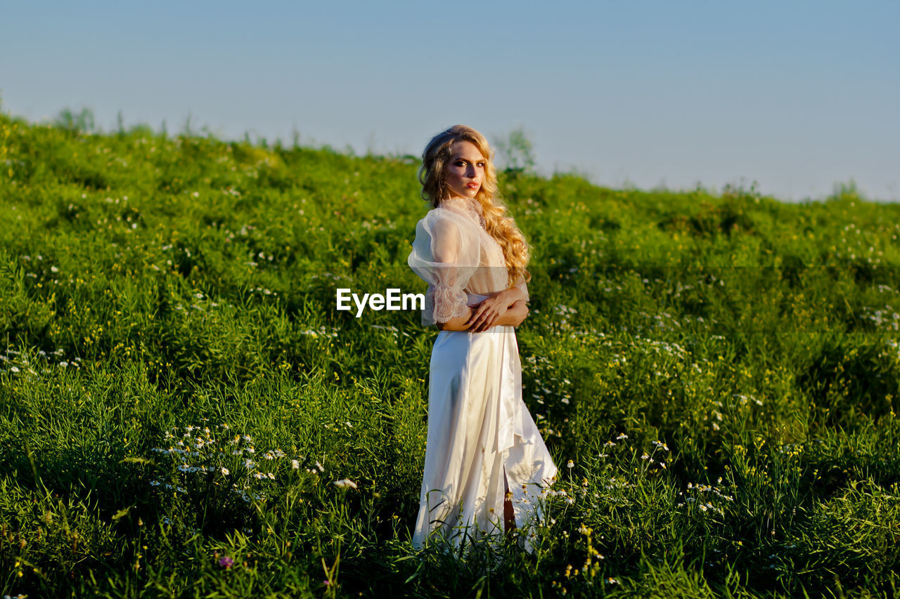 Young woman on field