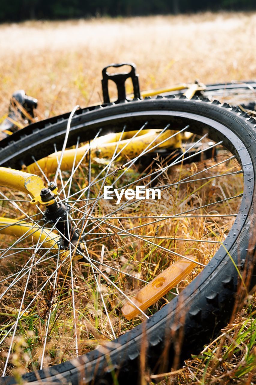 Close-up of bicycle on field