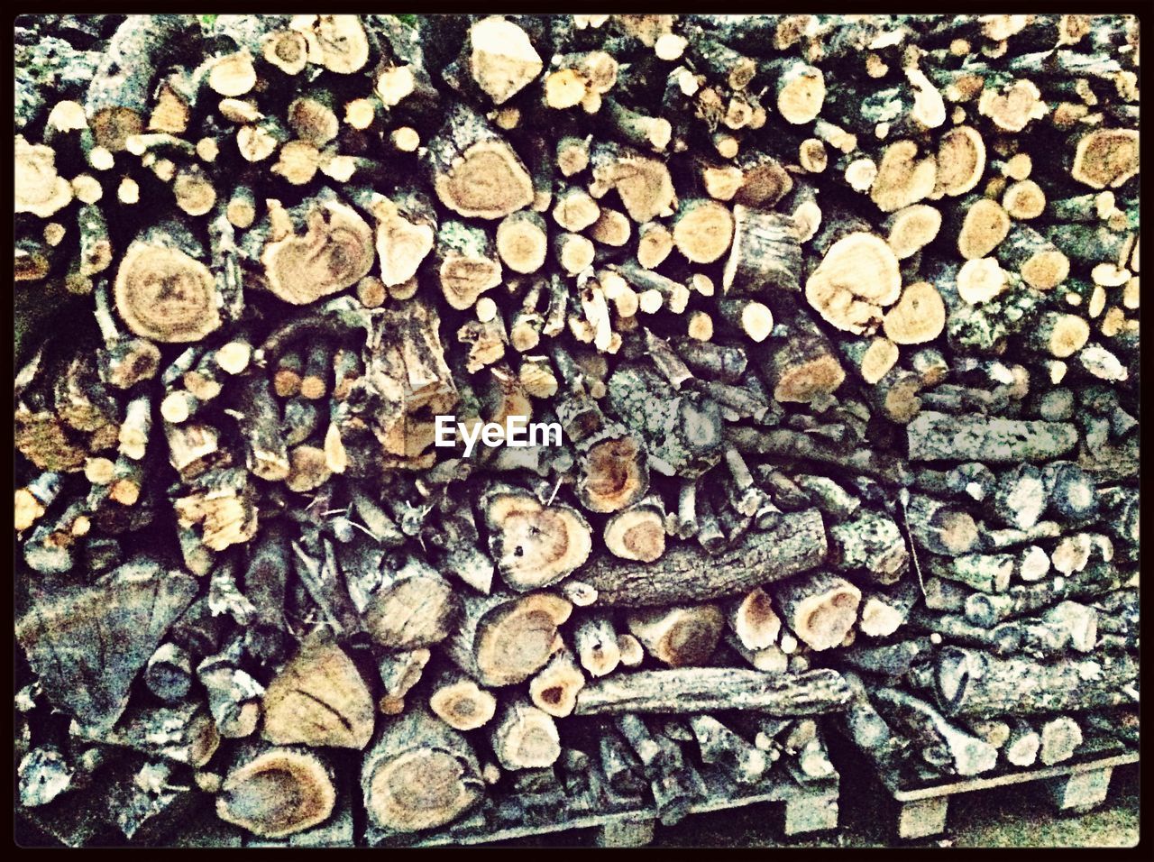 Full frame shot of stacked logs