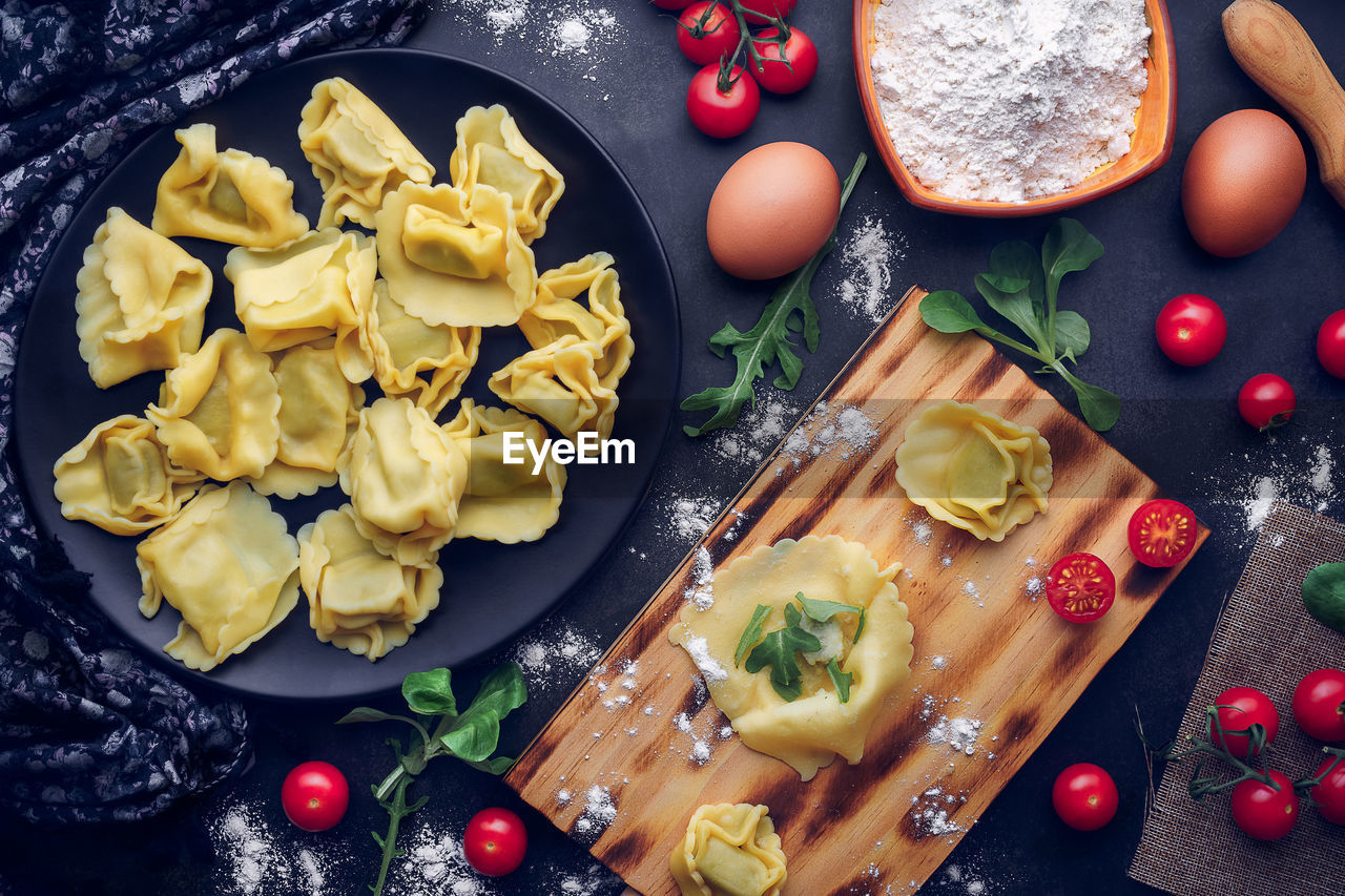 Preparation of italian pasta with ingredients. gastronomic concept