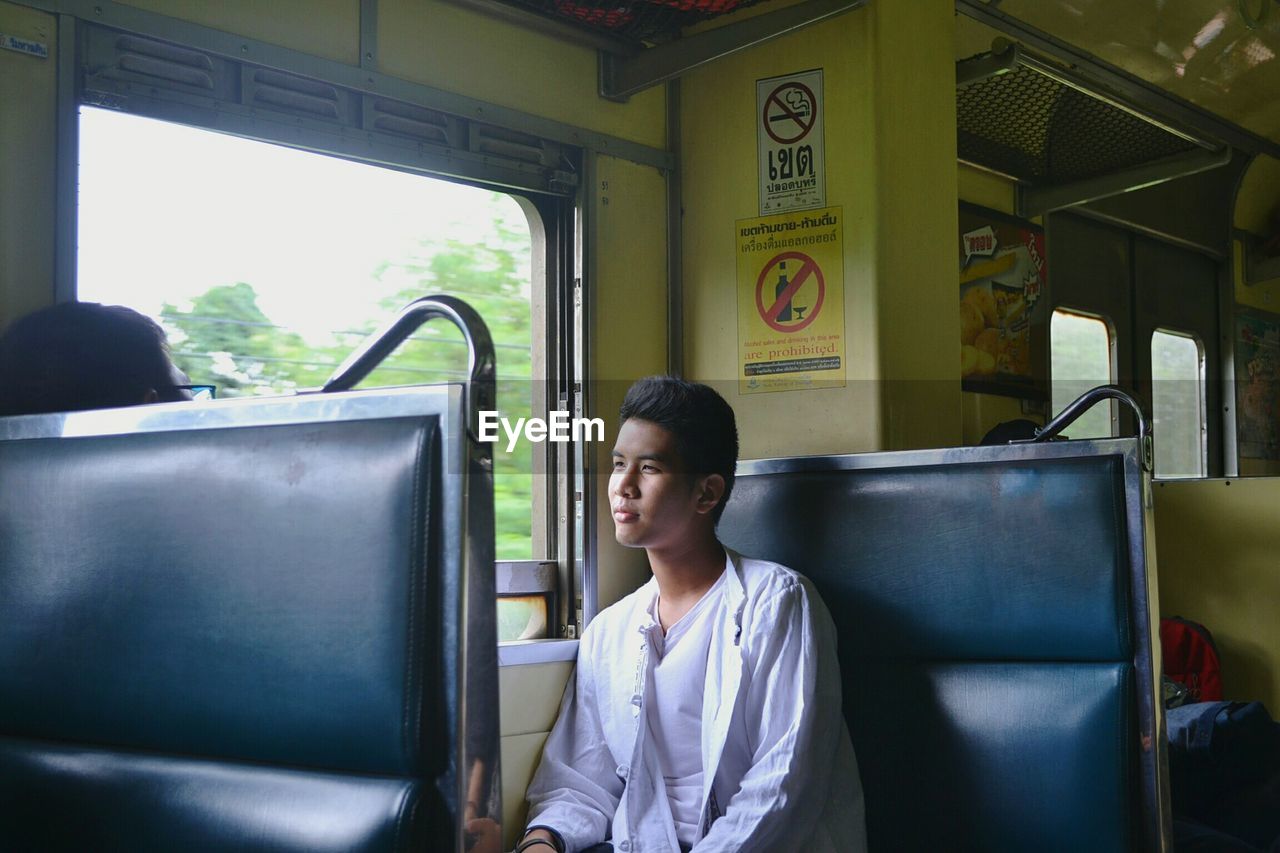 Young woman traveling in train