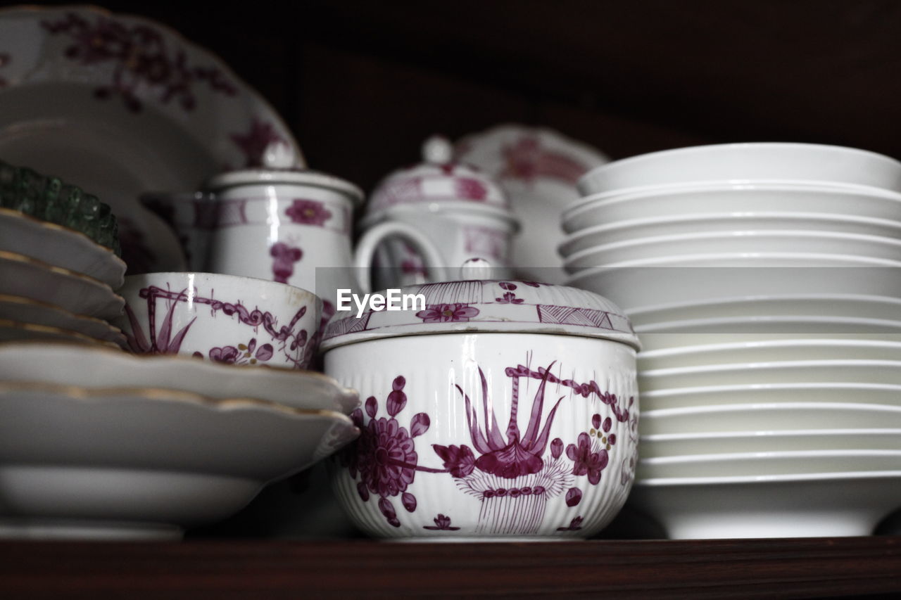 CLOSE-UP OF OBJECTS ON TABLE IN KITCHEN