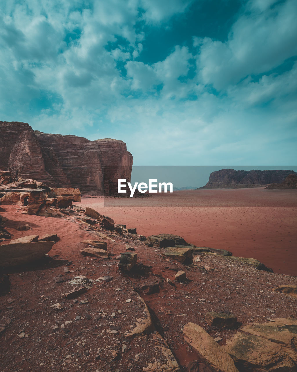 Rock formations on landscape against sky