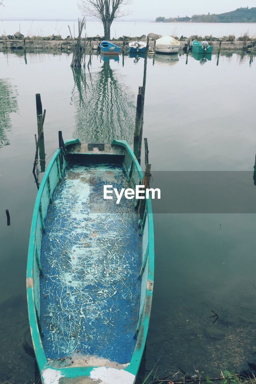 High angle view of boat at lakeshore