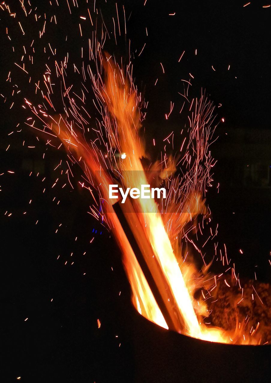 High angle view of bonfire at night